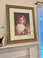 Full view of framed portrait on mantel