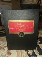 Front view of slipcase showing title panel