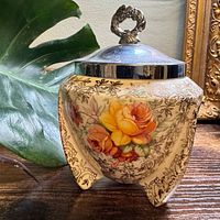 front view of A.J. Wilkinson Celtic Rose chintzware sugar bowl with lid