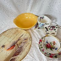 Yellow bowl, bird plate, floral cup & dishes