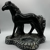Full view of chalkware horse statue with glass dish inserted in base