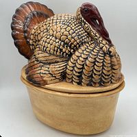 Front view of assembled turkey covered dish showing painted detail