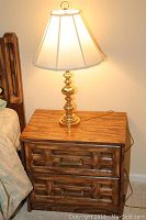 Dresser made of wood with carved drawer fronts, showing minor wear with natural wood grain finish