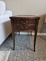 Front view of antique end table