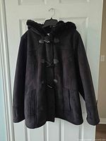 Front view of black Croft & Barrow coat showing toggle closures, zipper and pockets