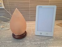 Salt lamp and Verilux HappyLight side by side on countertop