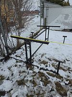 Overall view of steel frame set on ground in snow
