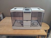 Front view showing overall humidifier and both water tanks