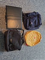 All four bags laid out on floor