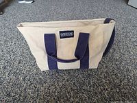 Front view of Lands' End canvas bag zipped, logo visible