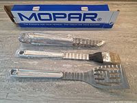 boxed Mopar set with three utensils wrapped in plastic