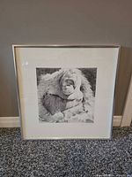 Front view of framed orangutan print showing artwork, mat, and frame