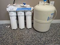 Filter manifold and storage tank front view