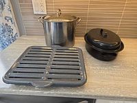 Stock pot, roaster with lid closed, broiler pan grate