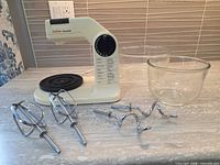 Mixer base, two glass bowls, beaters, dough hooks overview