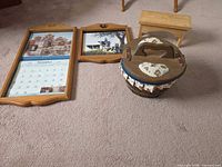 All four items: two calendar frames, basket, stool