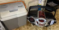Sony Xplod boombox next to Mobicool cooler