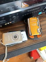 Front view of both cameras side by side on table