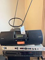 Full view of stacked Sirius boombox, Digitech GSP5 and Technics CD player