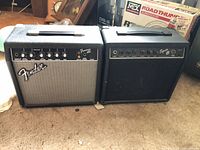 Front view of both amplifiers side by side