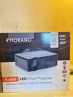 Box front showing Fiorano F-660 LED Smart Projector branding