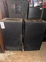 Front view of both JVC speakers showing overall condition