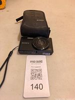 Camera and case overview with lot tag visible