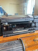 Sony turntable stacked on Harman/Kardon AVR 520 receiver