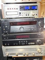 Front view of stacked Superscope, Sony, Yamaha and Luxman units