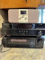 Stacked view of tabletop radio, Yamaha receiver and Sony receiver