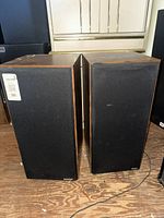 Front view of both Paradigm floor speakers with grills on