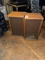 Pair of wood cabinet speakers side by side
