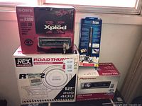 Stacked boxed items showing all four product packages