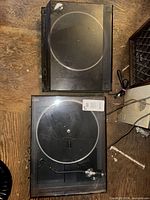 Two turntables side by side showing overall condition and components