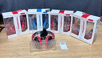 Five boxed Targus Studio headphones plus one shown out of packaging