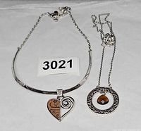 Both Brighton necklaces side by side showing overall design and pendants