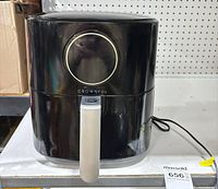 Front view showing Crownful logo, handle, control dial