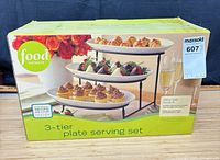 Front of boxed Food Network 3-tier plate serving set showing product image and brand