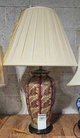 Front view of lamp with shade showing overall appearance