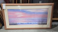full view of framed seascape art
