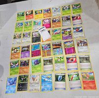 Full spread of all cards laid out on table
