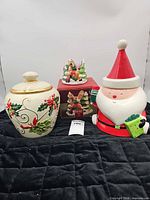 Group shot of both cookie jars and Rudolph candle holder with box