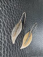 Front view pair leaf-shaped sterling earrings