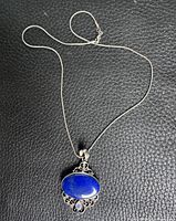 Full view of sterling snake chain and pendant