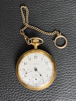 Front view of pocket watch with attached chain