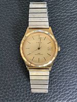 Front view of Timex watch showing dial, case, and bracelet