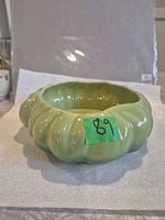 Top view of two-tone green rippled pottery bowl