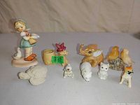 Group shot of all nine animal-themed figurines