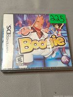 Front of sealed Boogie Nintendo DS game showing cover art, shrinkwrap, ESRB, inventory sticker