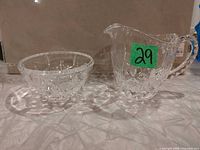 Cream pitcher and sugar bowl side view